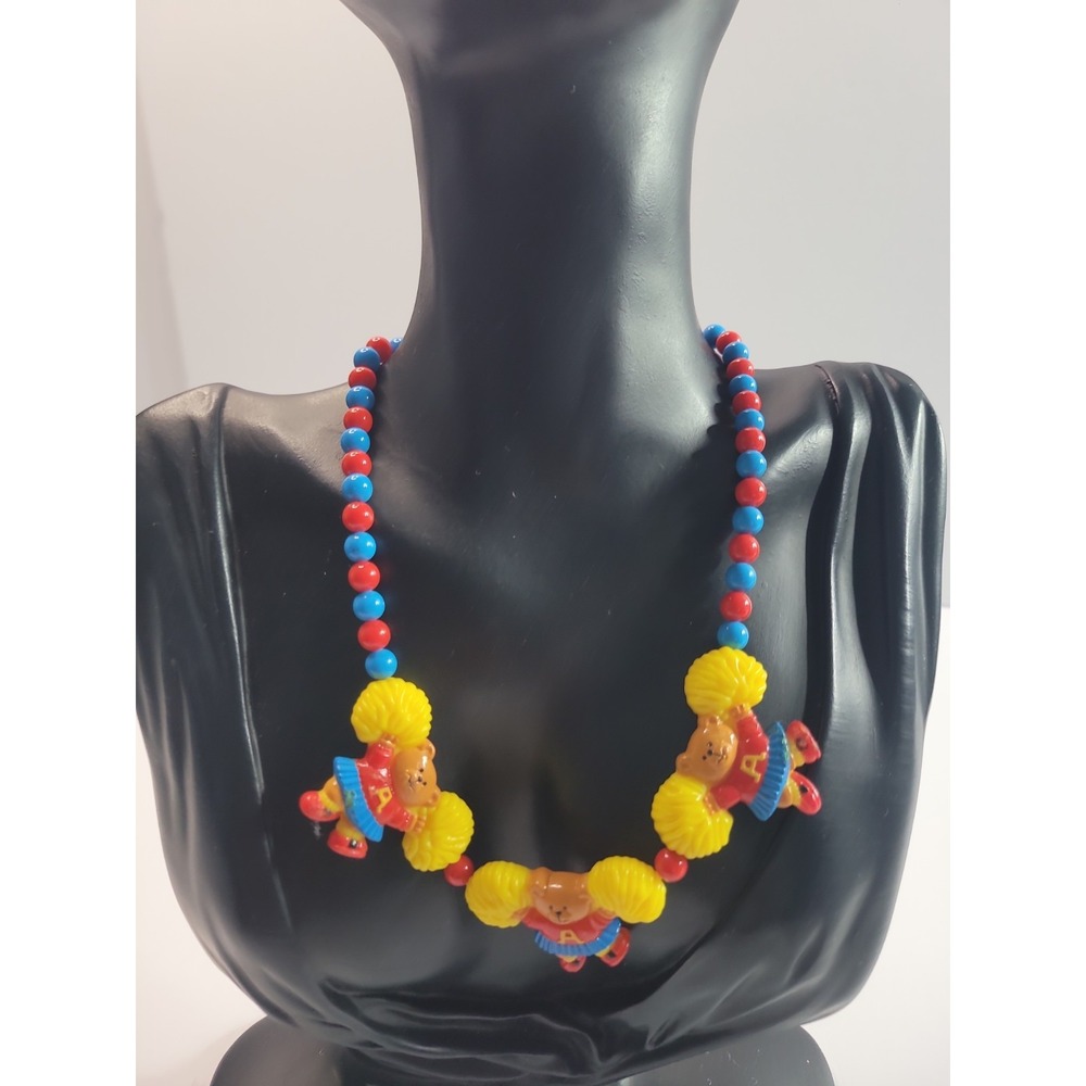 Vintage Teddy Bear Cheerleader Necklace Red Blue Yellow Plastic Beaded